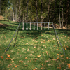 metal know your limits kyl targets assembled on conduit alternativer quick stand kit legs and crossbar in a wooded setting