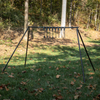 angled view of heavy duty assembled rimfire know your limits steel targets with the conduit alternative tubes and conduit stand brackets in a wooded area