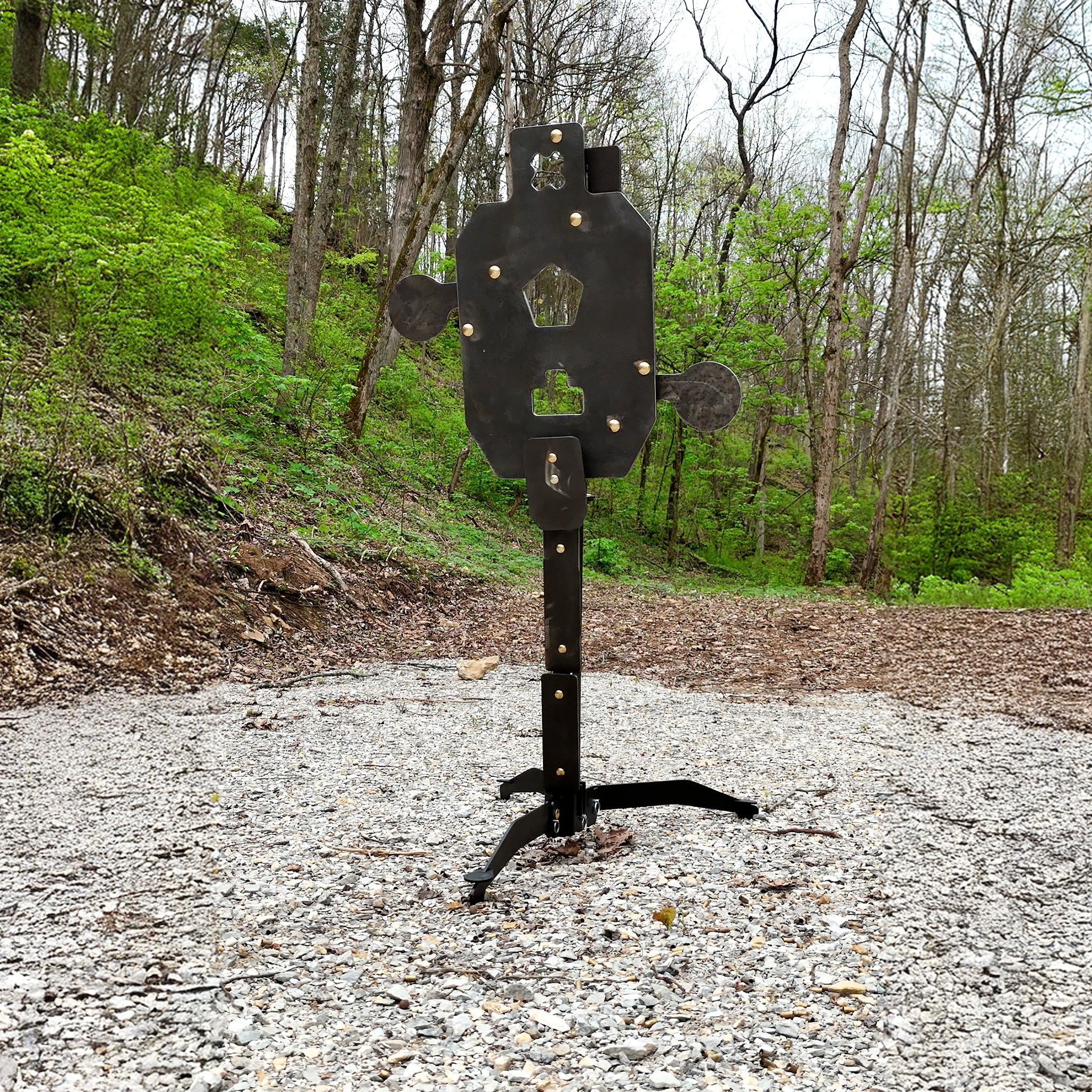 double tap industries triple threat fully armored stand assembled with paddles out to show hit zones set up at outdoor range
