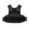 Front view of Caliber Armor covert concealable carrier in black laying flat on a white background