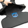 Soft Body Armor panel being inserted into cavity of the Caliber Armor covert concealable on a white background