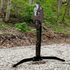 ar500 vital strike reactive target mounted on a spiked stand that has ar500 guard face  plates on the body of the stand, rigid mount y stepping the spiked stand legs into the ground