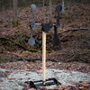 Small 3/8 inch steel dual spinning reactive target at a shooting range