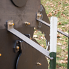 Close-up of metal brackets that have been bolted on the backside of large sasquatch steel target and slid onto t-posts to keep target stable