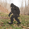 Unpainted bigfoot-shaped sr500 steel silhouette target with stand out in the woods