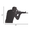 Steel silhouette target of a man holding a rifle on a white background with dimensions labeled
