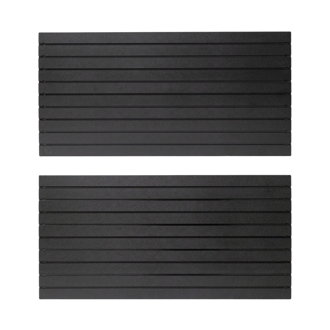 Two black plastic rectangular tactical slat wall panels one of which has a small Double Tap Ind. logo cut into the surface of lower left corner,  name of panels are Assault Wall