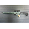 Assault Wall magazine mounted hanger for AK47 rifles, Left facing mount with gun hanging from mag well on a black Assault Wall slat wall panel