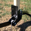 close up of portable and adjustable spiked base 2x4 steel target stand assembled at an outdoor range