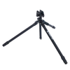 black aluminum shooting tripod with saddle clamp attachment and legs shortened and extended to demonstrate adjustability on a white background