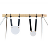 Double tap industries rubber strap steel target mounting kit on 2x4 stand assembled on conduit stand on white background
