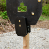 double tap industries AR500 triple threat steel target close up image of armored 2x4 hanger set up at outdoor range