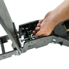 Close-up of a black metal fall popper base with bolt and wing nut used to calibrate rear falling popper on a white background.