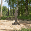 AR500 fall popper with base for forward or rear falling with a 28 inch classic ipsc popper target in wooded surroundings