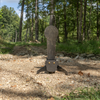 AR500 fall popper with base for forward or rear falling with a 22 inch classic ipsc mini-popper target in wooded surroundings