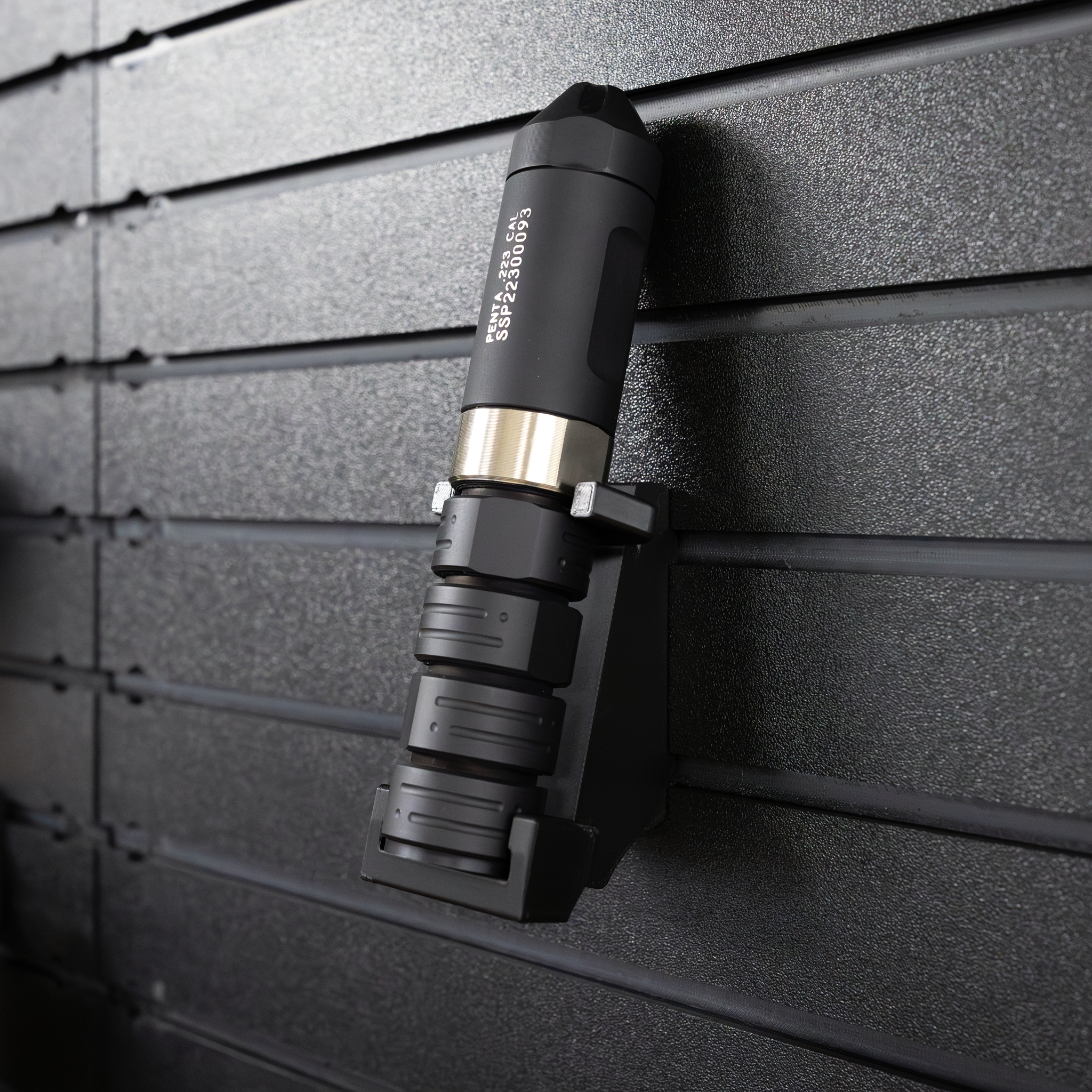 Vertical suppressor storage using Assault Wall system